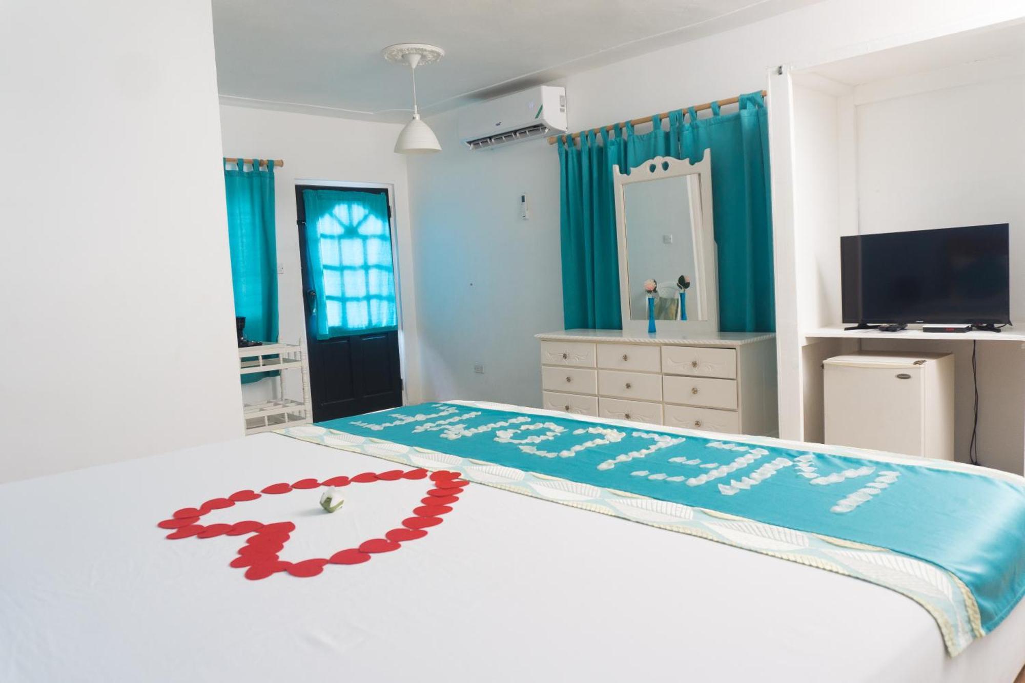 טרזר ביץ' Beyond Sunset Resort & Villas מראה חיצוני תמונה
